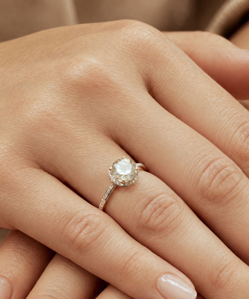 Gold ring with green amethyst and diamonds