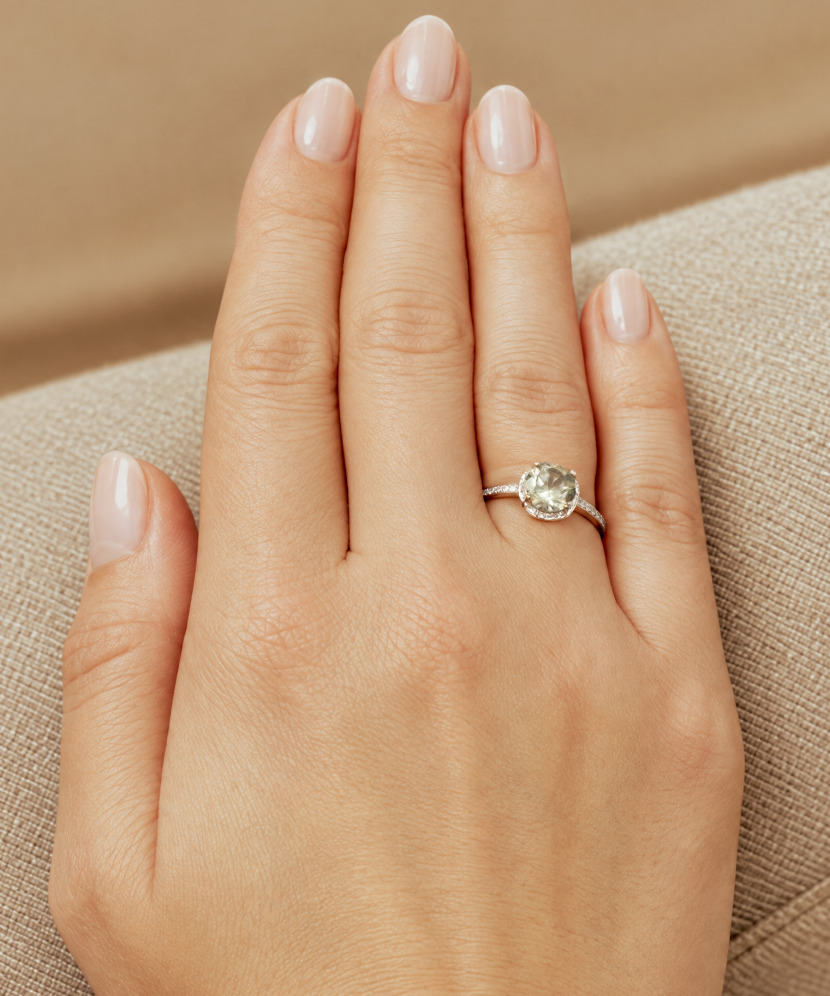 Gold ring with green amethyst and diamonds