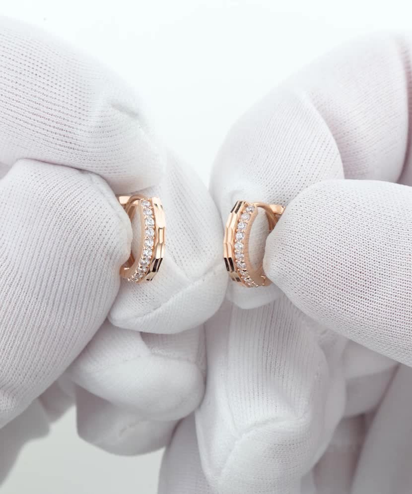 Gold earrings with zircons