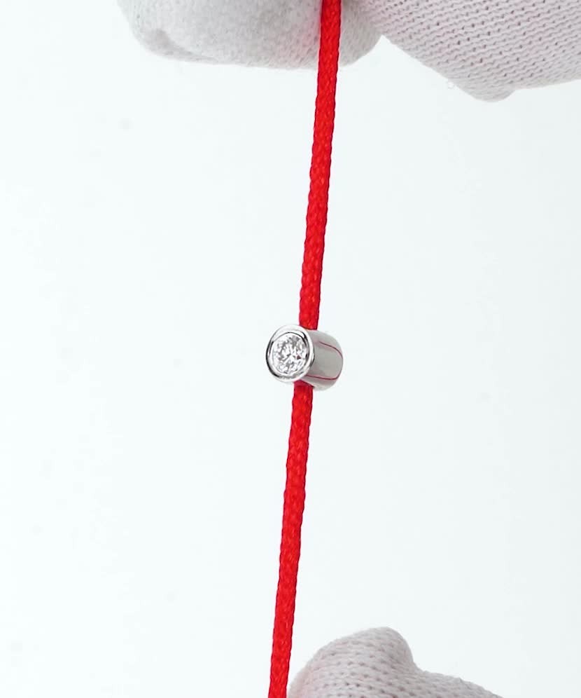 Red string bracelet with white gold and diamond pendant 0.05ct