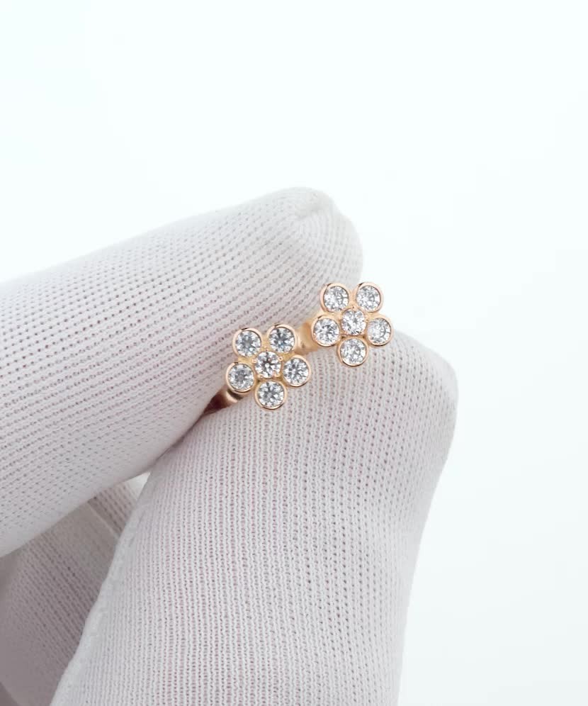 Gold earrings with zircons "flowers"