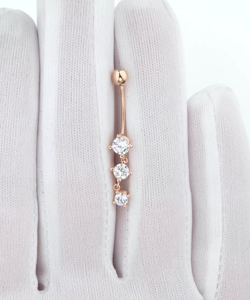 Золотая серьга в пупок с цирконами