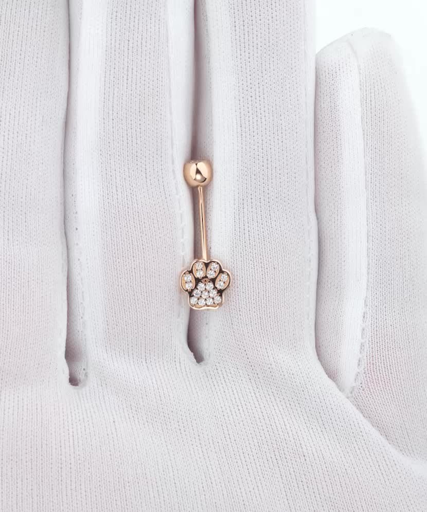 Золотая серьга в пупок с цирконами