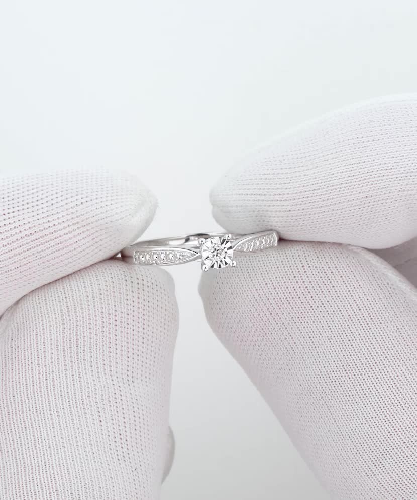 White gold ring with diamonds