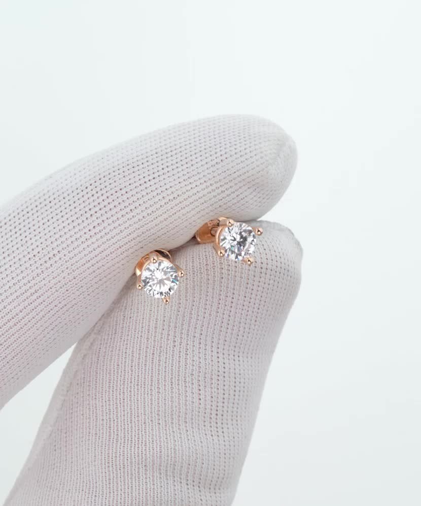 Gold earrings with zircons