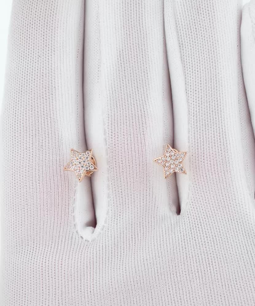 Gold earrings with zircons "star"