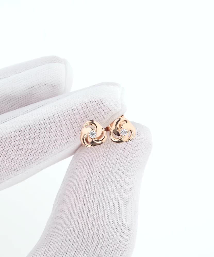 Gold earrings with zircons