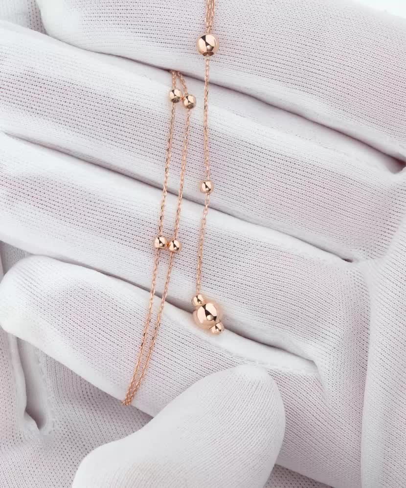 Двойная золотая цепочка с подвесками Двойная золотая цепочка с подвесками