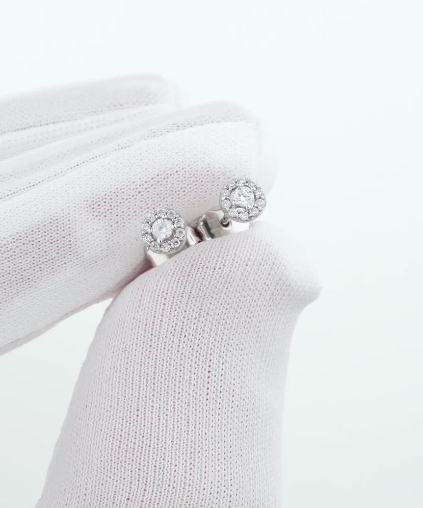 White gold earrings with zircons