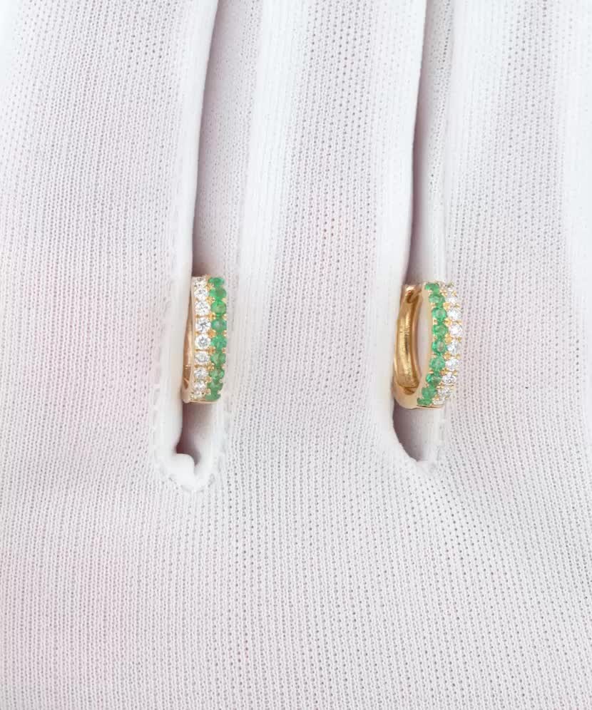 Серьги из желтого золота с бриллиантами и изумрудами