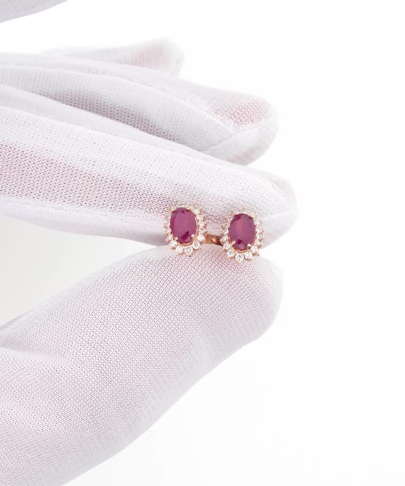 Gold earrings with diamonds and rubies Gold earrings with diamonds and rubies