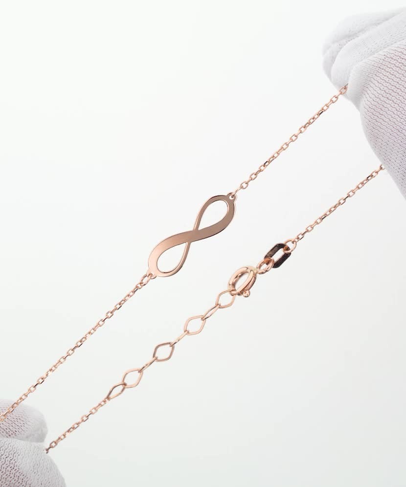 Золотой браслет "Бесконечность"