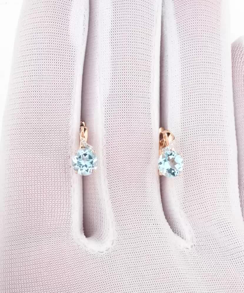 Золотые серьги с алмазами и топазами