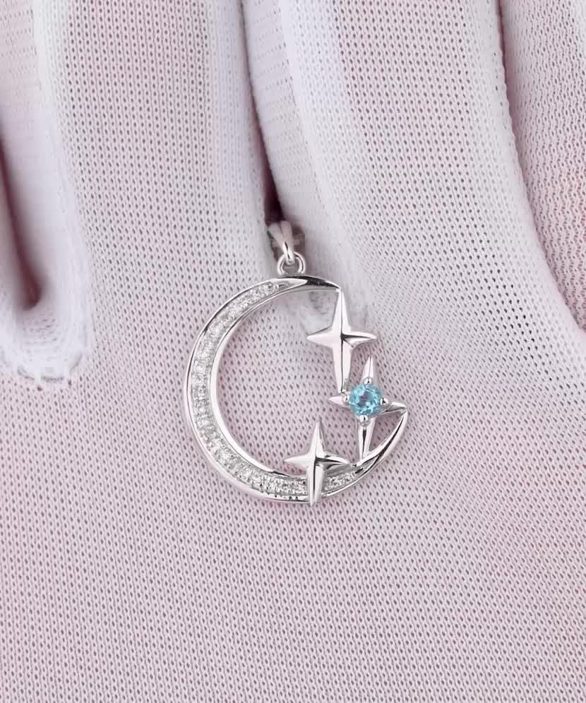 Подвеска из белого золота с бриллиантами и топазом