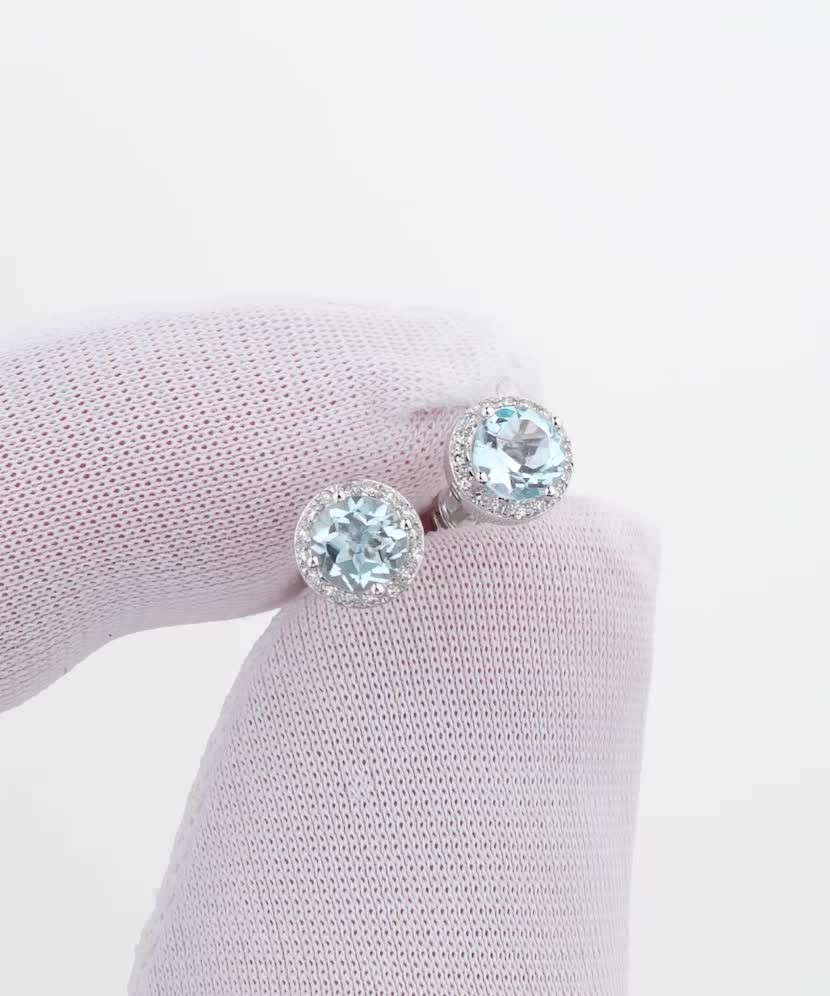 White gold earrings with topazes and diamonds White gold earrings with topazes and diamonds