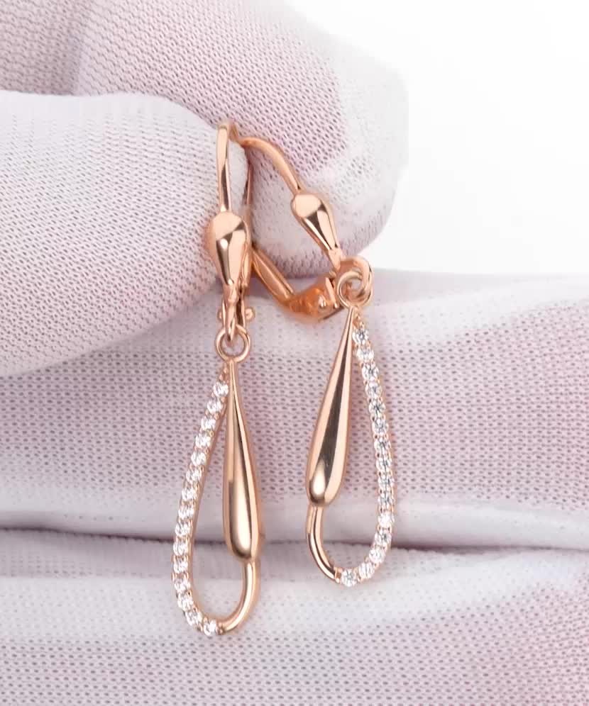 Gold earrings with zircons