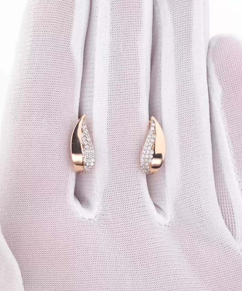 Gold earrings with zircons