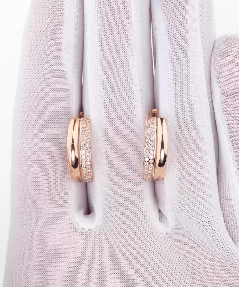 Gold earrings with zircons