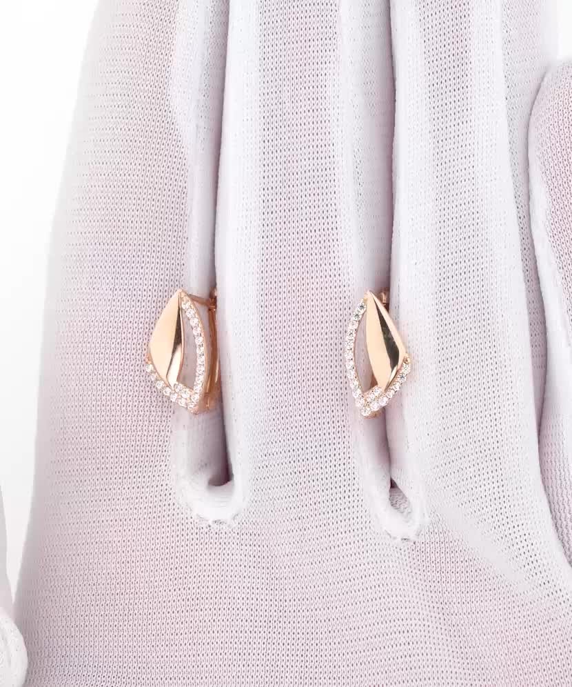 Gold earrings with zircons