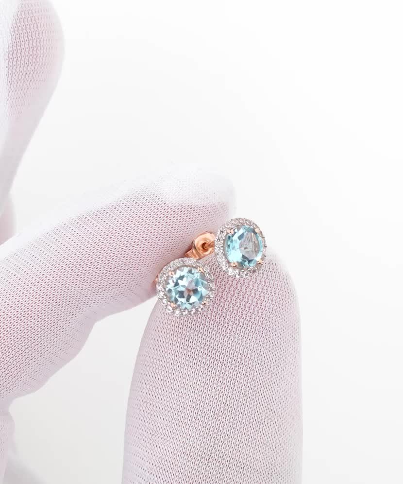 Gold earrings with zircons