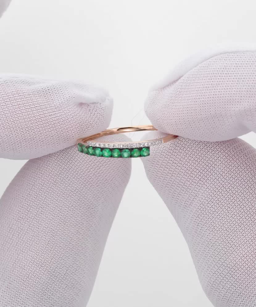 Gold ring with emeralds and diamonds Gold ring with emeralds and diamonds