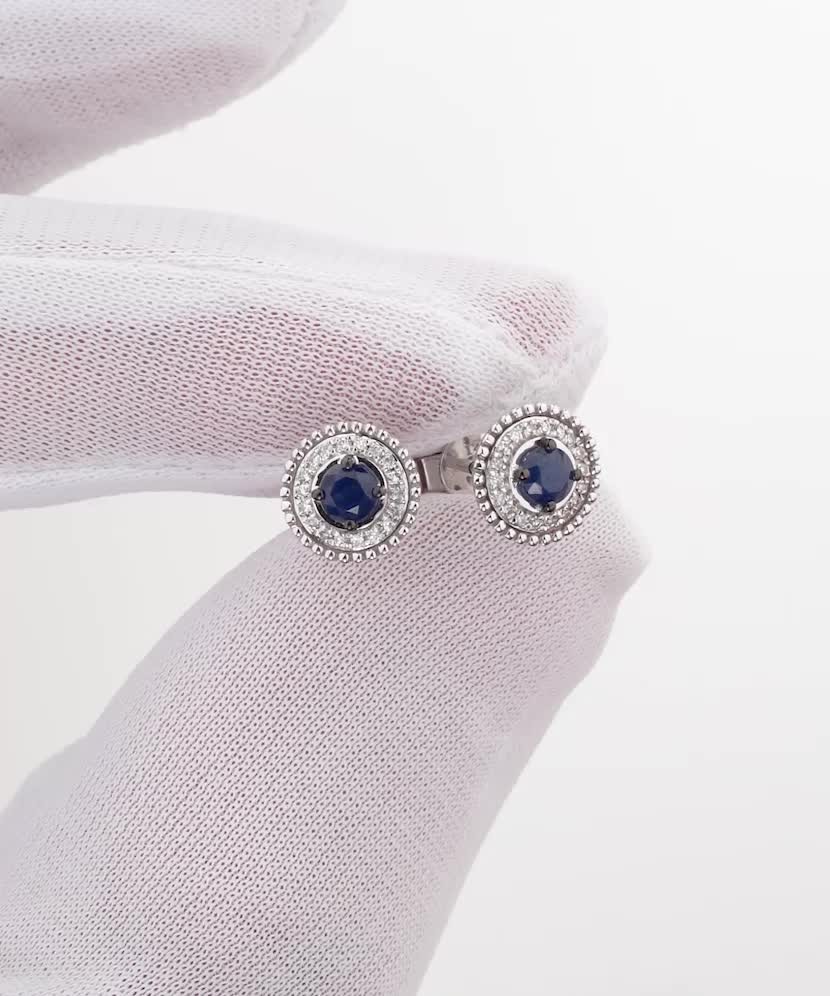 White gold earrings with sapphires and diamonds White gold earrings with sapphires and diamonds