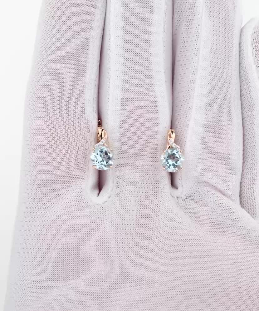 Yellow gold earrings with topazes and diamonds