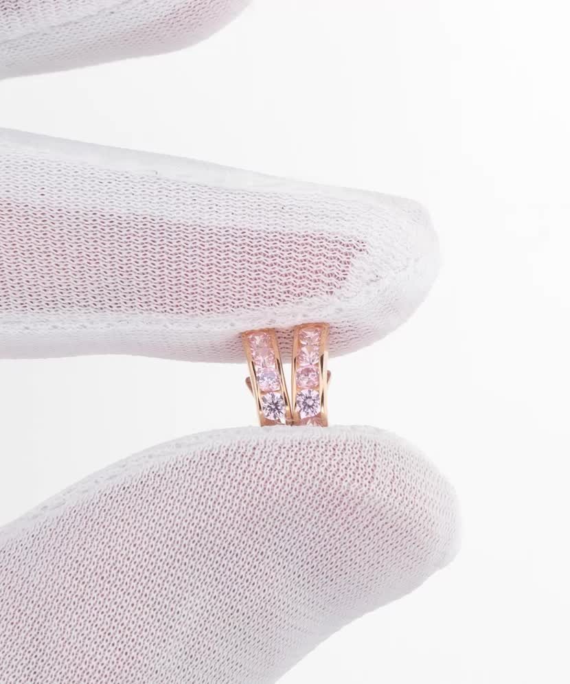 Gold earrings with zircons