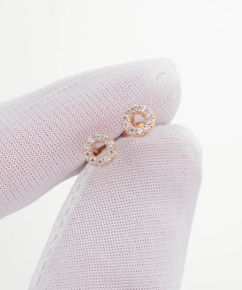 Gold earrings with zircons