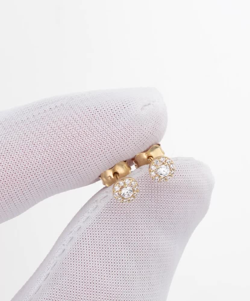 Gold earrings with zircons