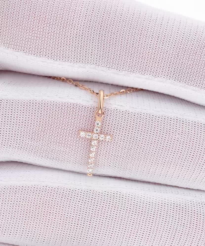 Gold pendant with zircons "cross"
