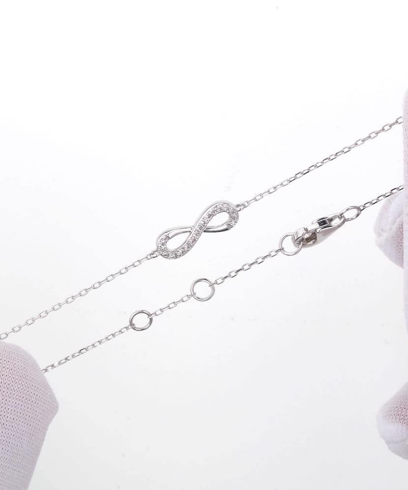 Браслет из белого золота с бриллиантами "Бесконечность"