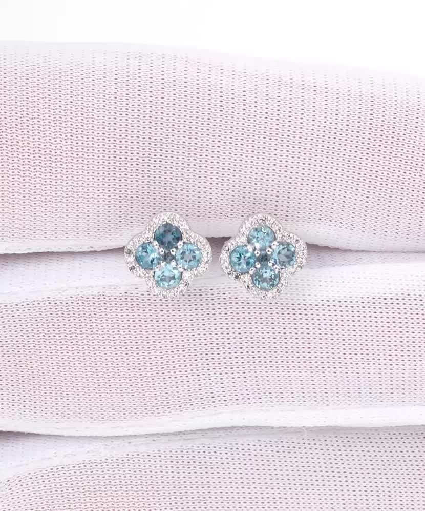 White gold earrings with topazes and diamonds