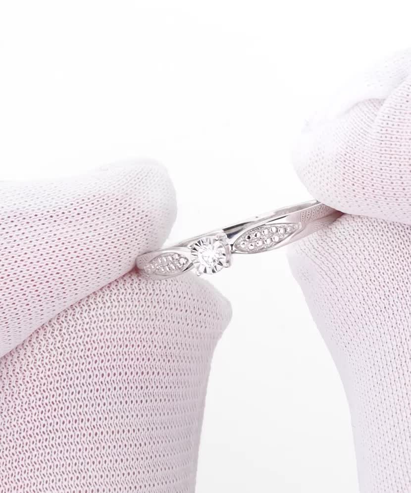 White gold ring with diamonds 0,04ct