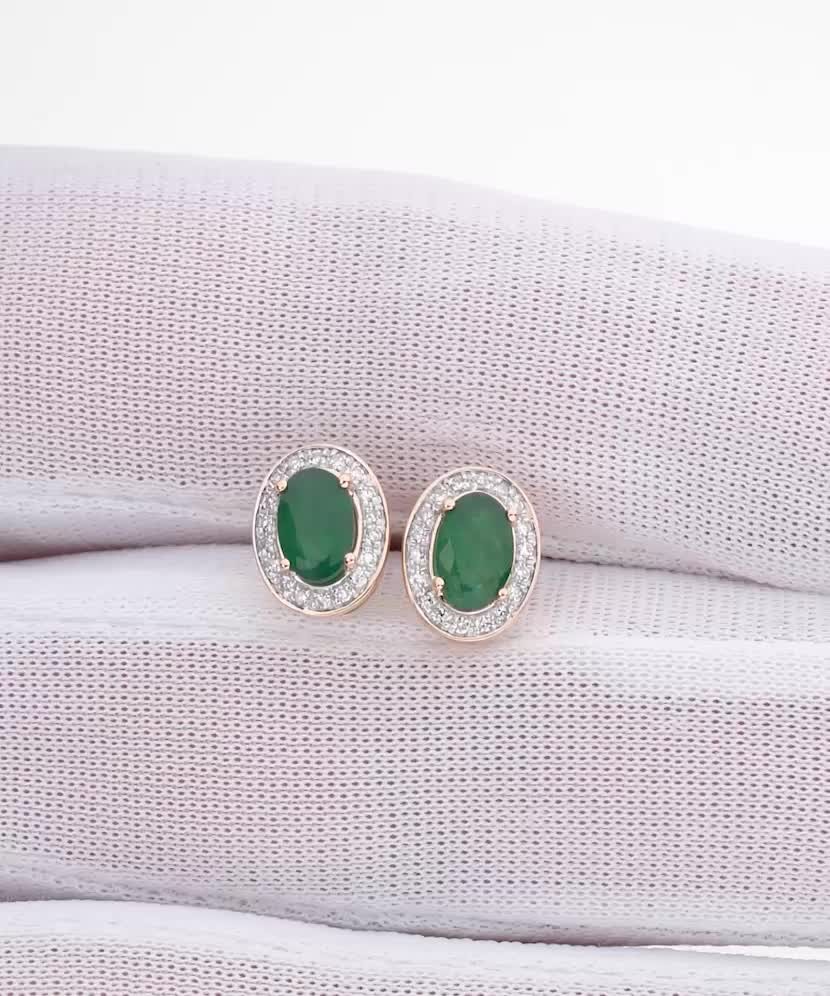 Gold earrings with emeralds and diamonds