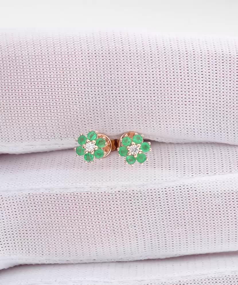 Gold earrings with emeralds and diamonds