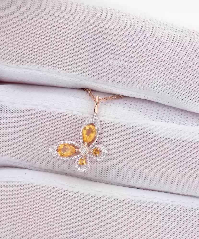 Gold pendant with citrines and diamonds