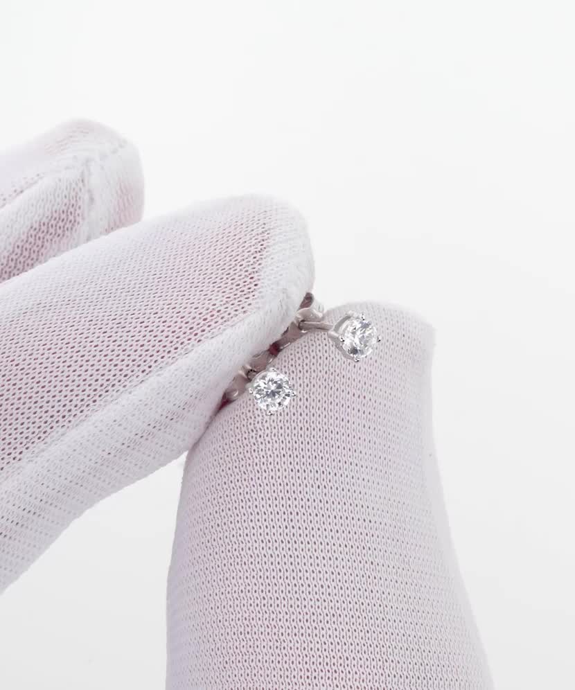 White gold earrings with zircons