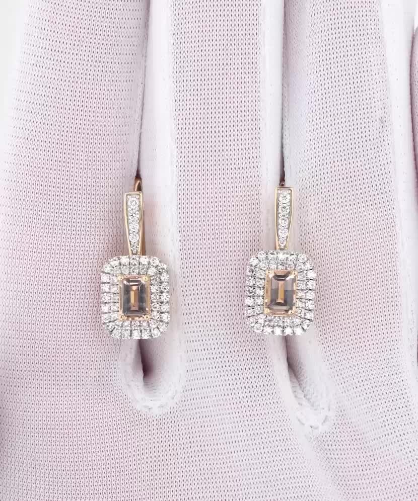 Yellow gold earrings with diamonds and morganites