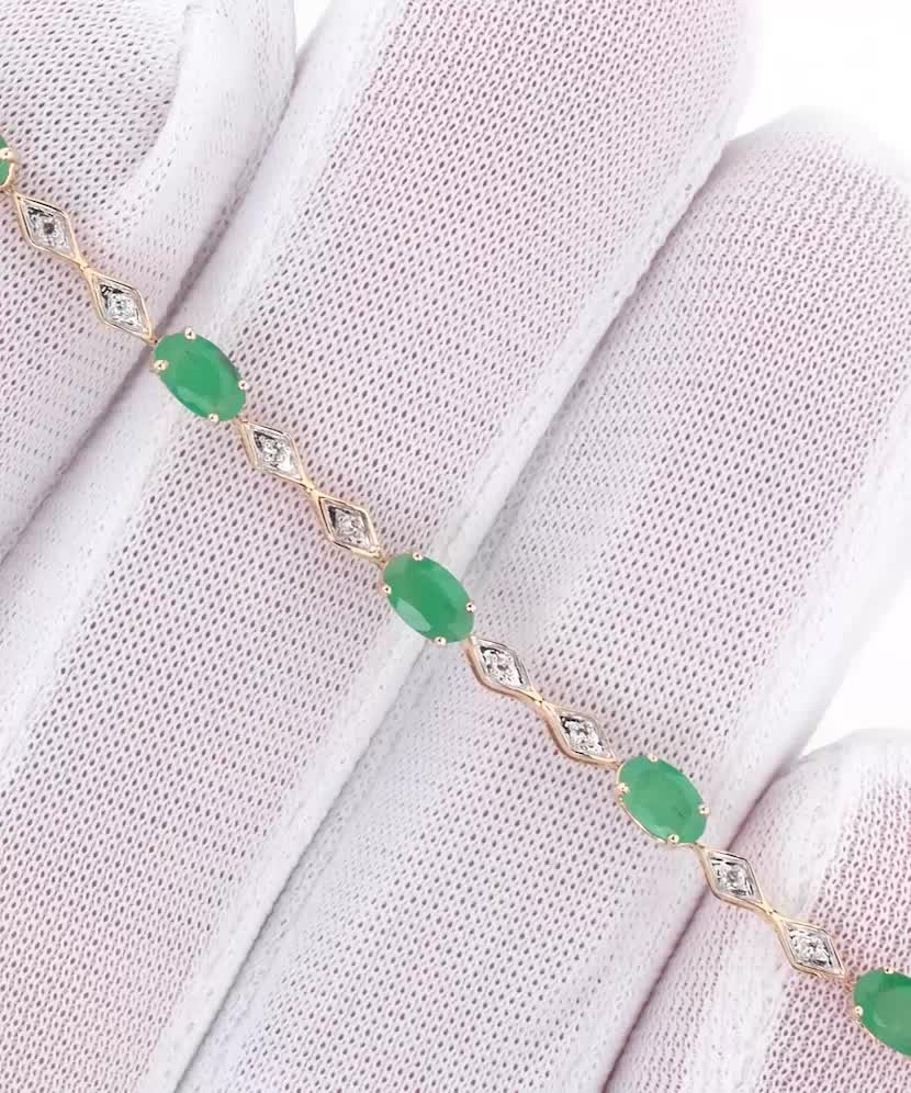 Yellow gold bracelet with diamonds and emeralds