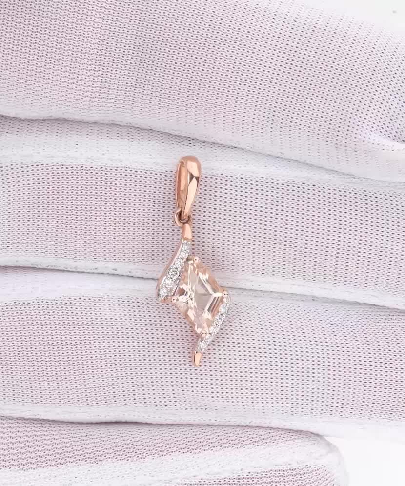 Gold pendant with diamonds and morganite