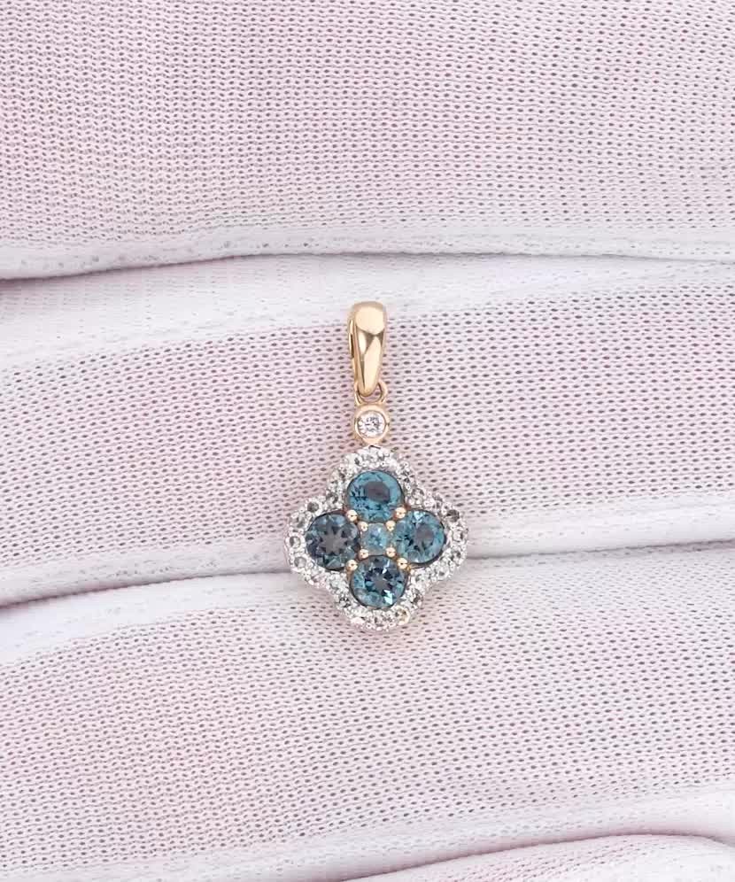 Yellow gold pendant with diamonds and London topaz