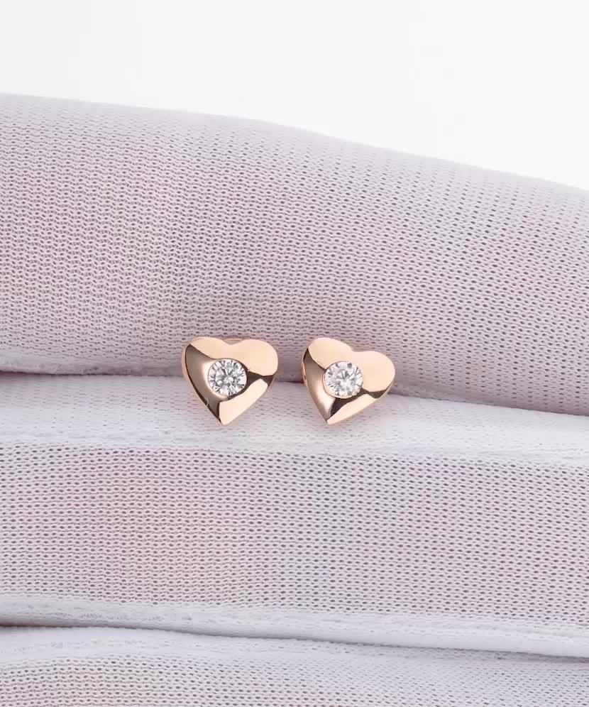 Gold earrings with zircons "heart"
