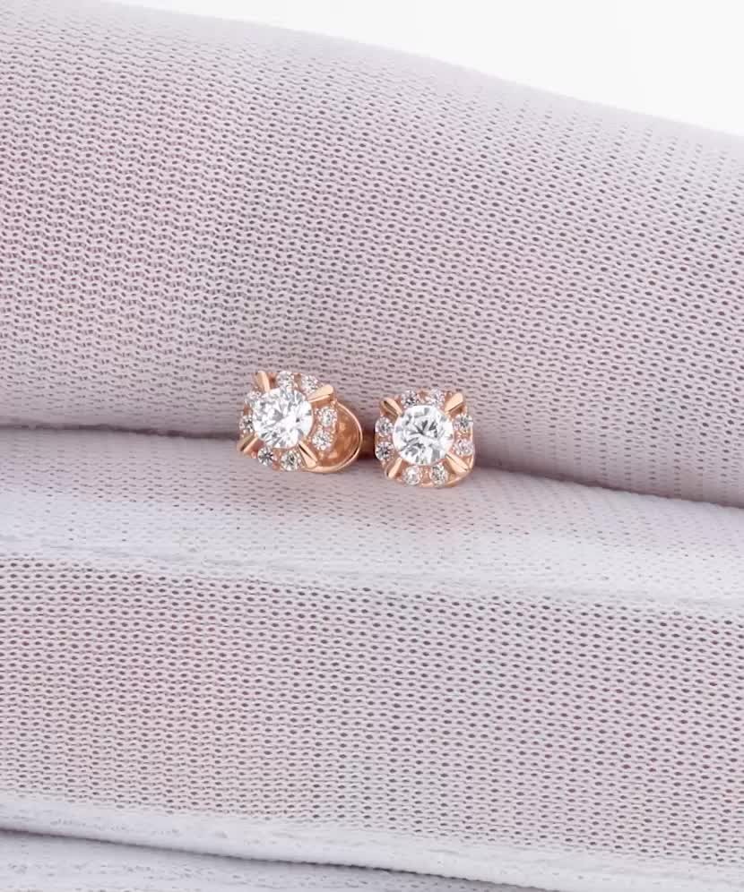 Gold earrings with zircons