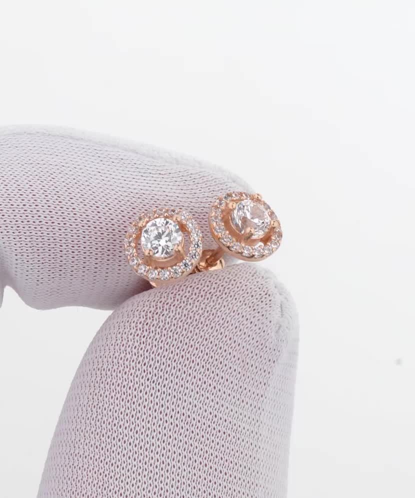 Gold earrings with zircons