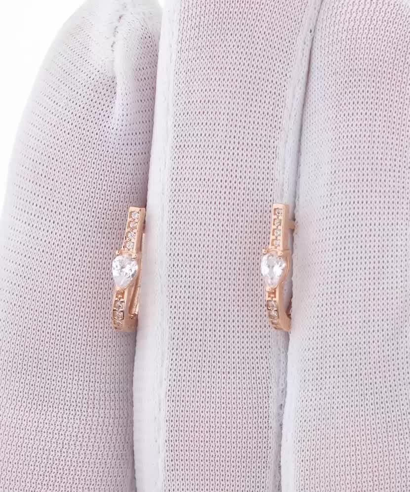 Gold earrings with zircons