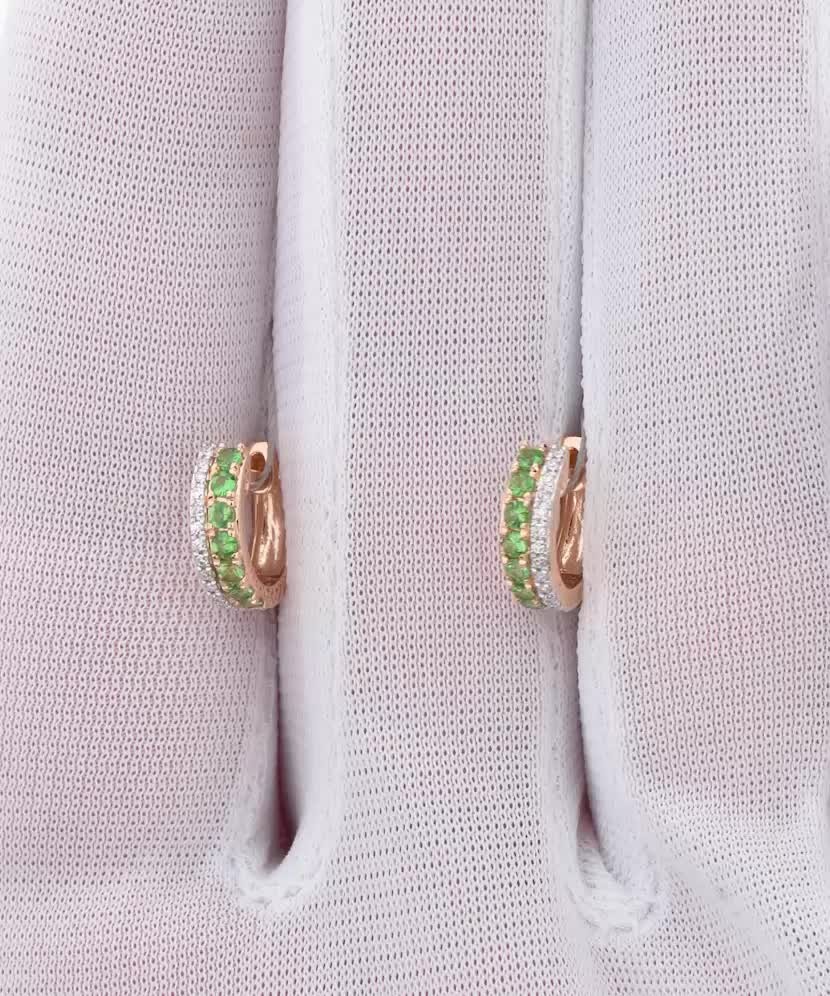 Gold earrings with diamonds and green garnet