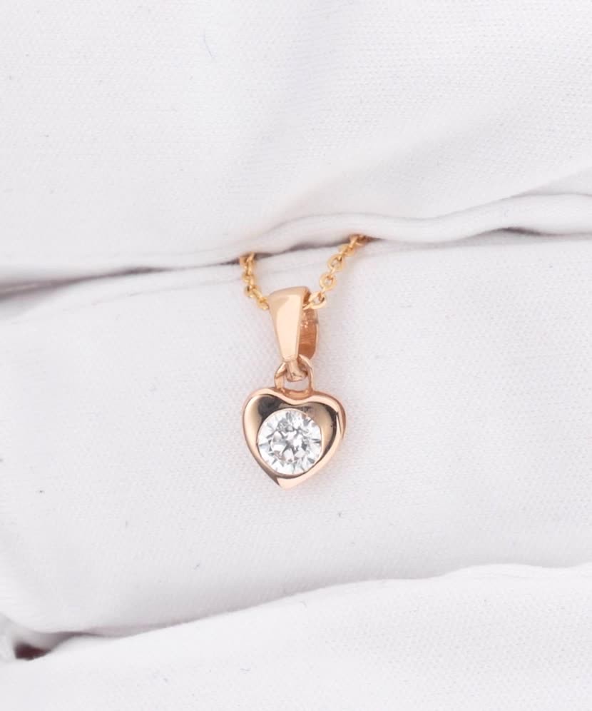 Gold pendant with zirconium "heart"