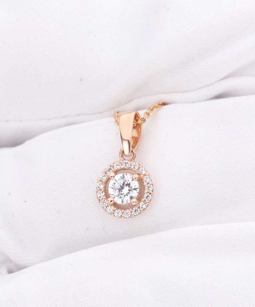 Gold pendant with zircons