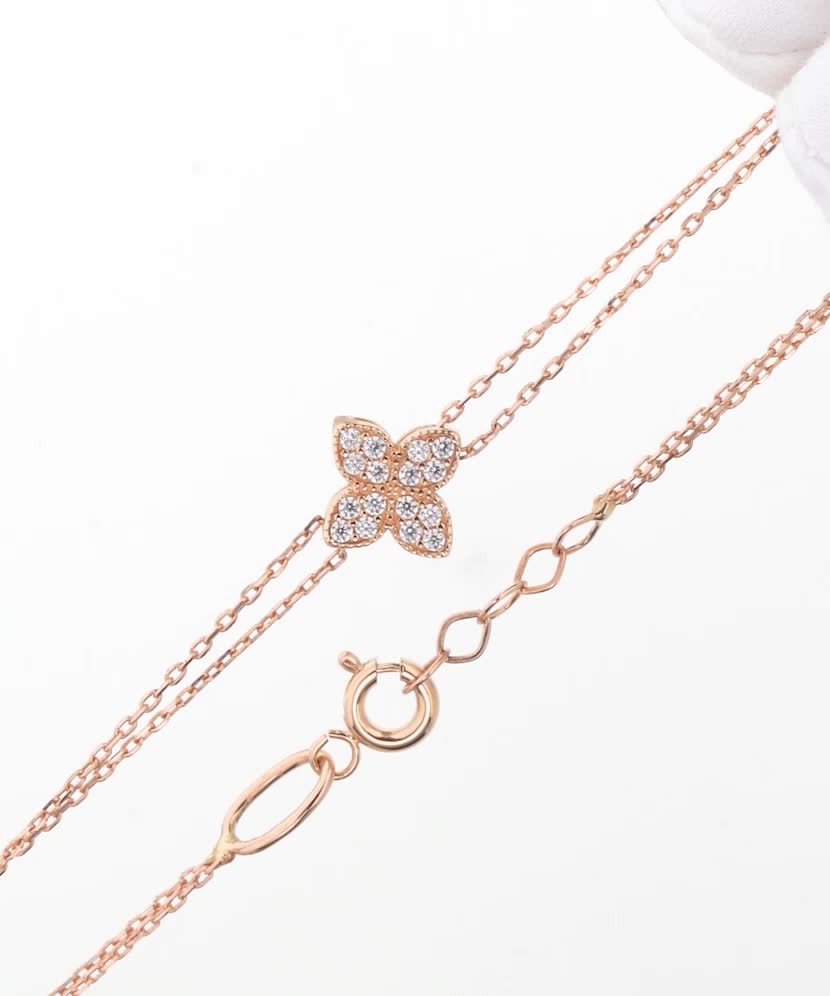 Gold bracelet with zircons